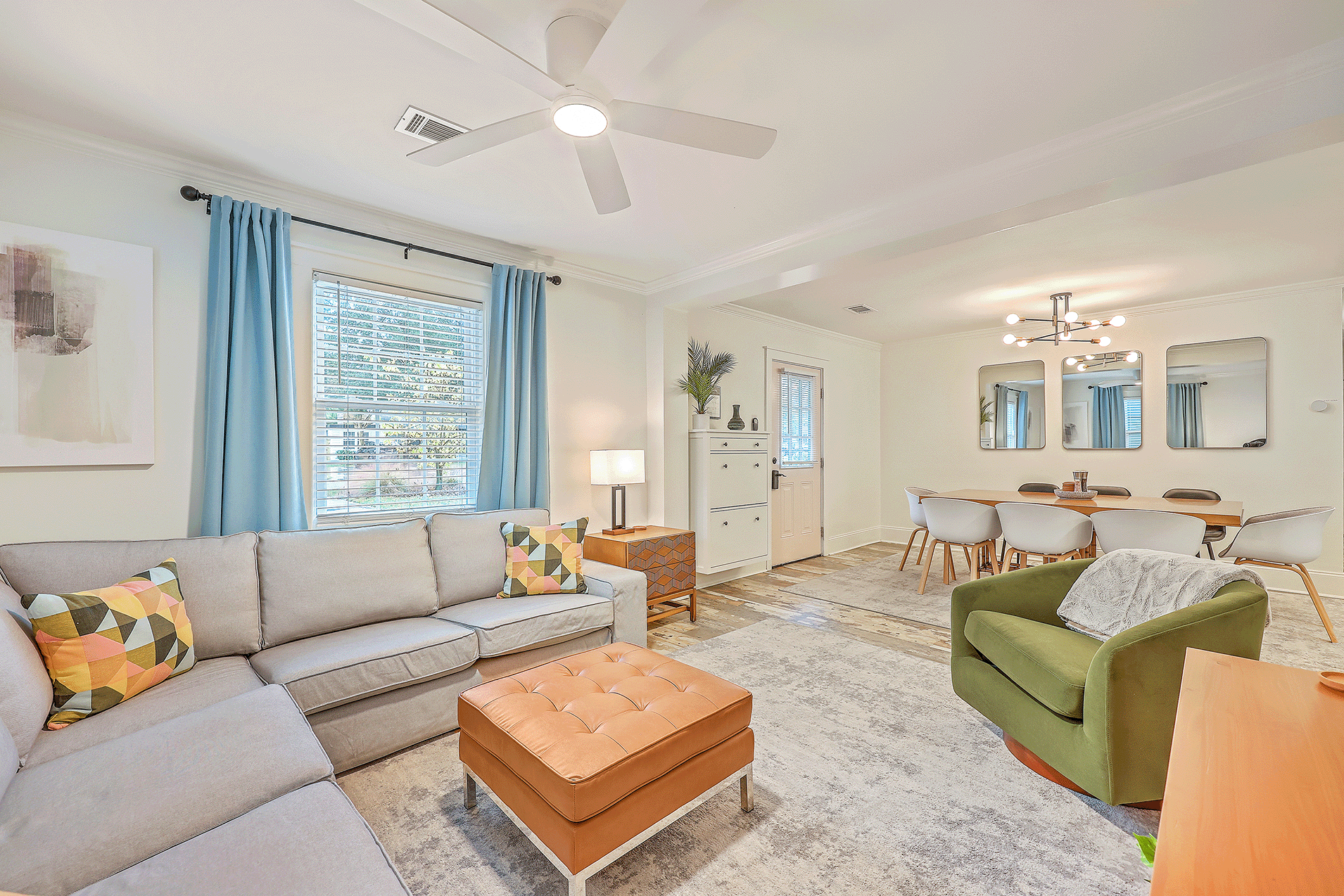 Photo of a Cottage living room with furniture and a ceiling fan in CorpComfort