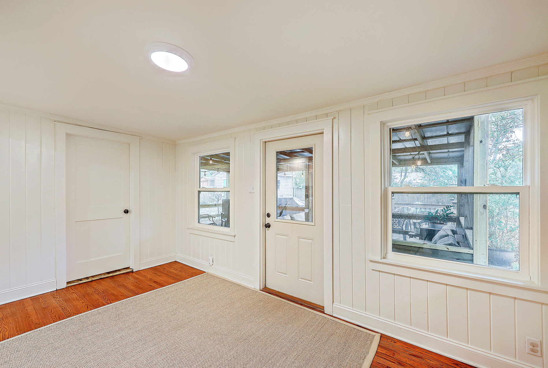 Entrance to a house Entrance to a house with a white door for CorpComfort
