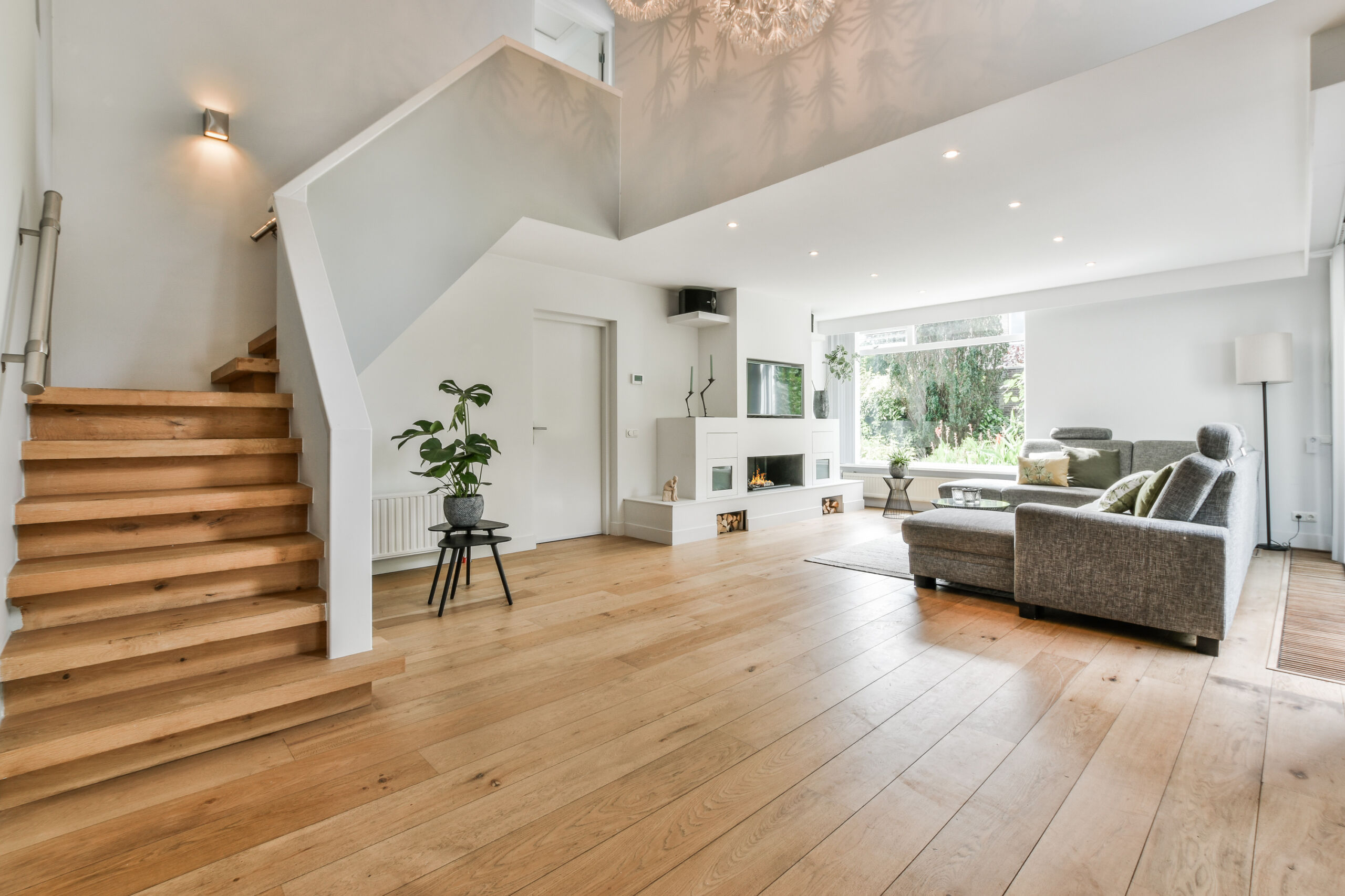 Image of a room with furniture and staircase Image of a room with furniture and a staircase leading to the second floor