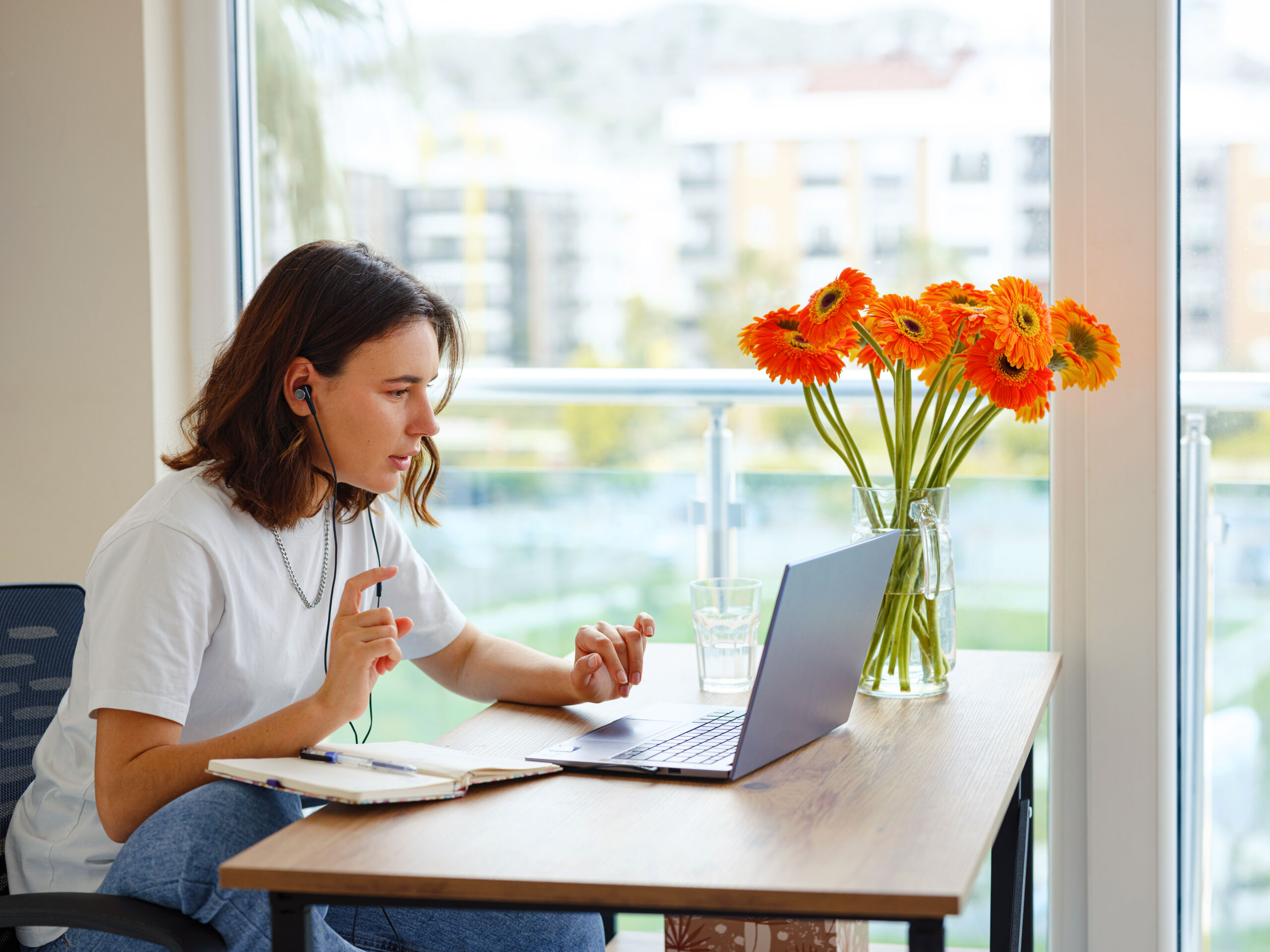 woman using laptop while working indoors 2023 11 27 05 01 35 utc scaled woman using laptop while working indoors