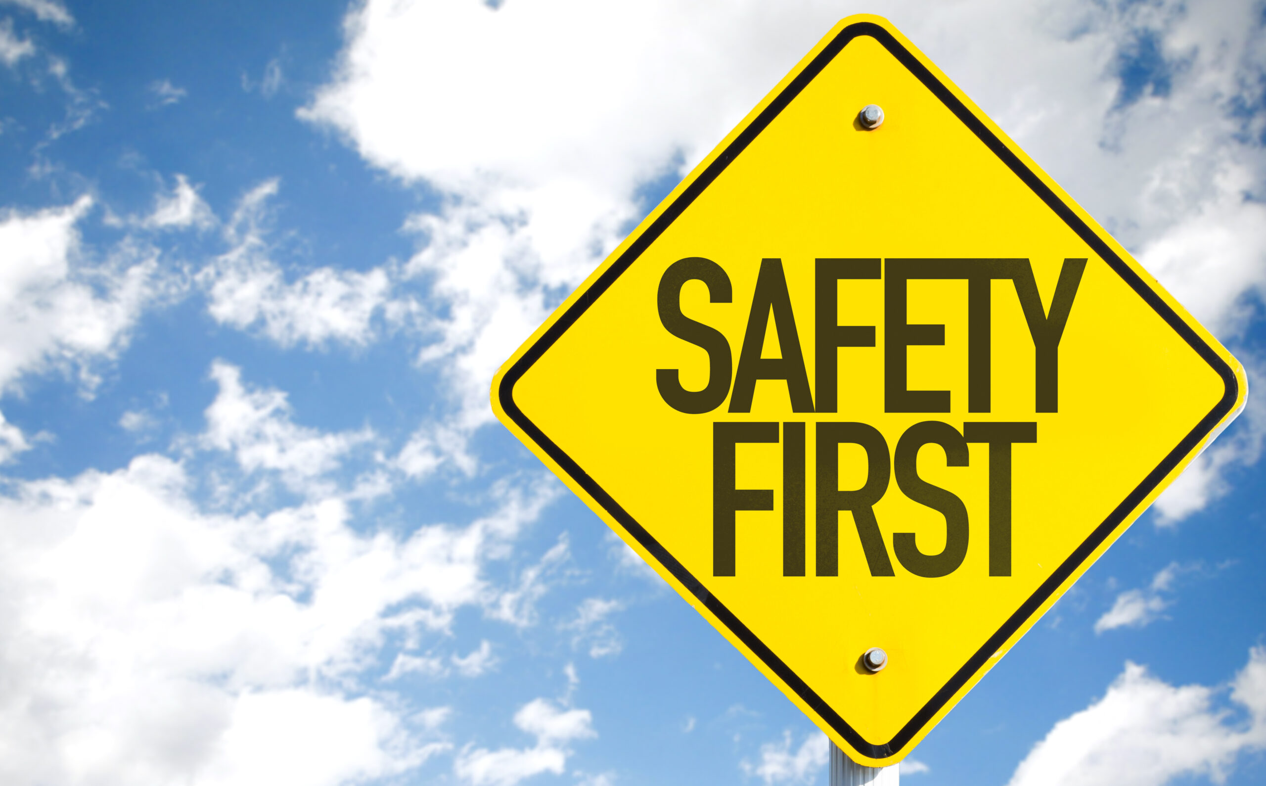 Safety First sign with sky background safety first